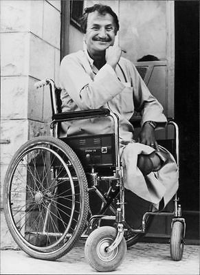 vintage-photo-of-bassam-shakaa-on-wheelchair-b94389b473267b7d9fa41d2f911aff25